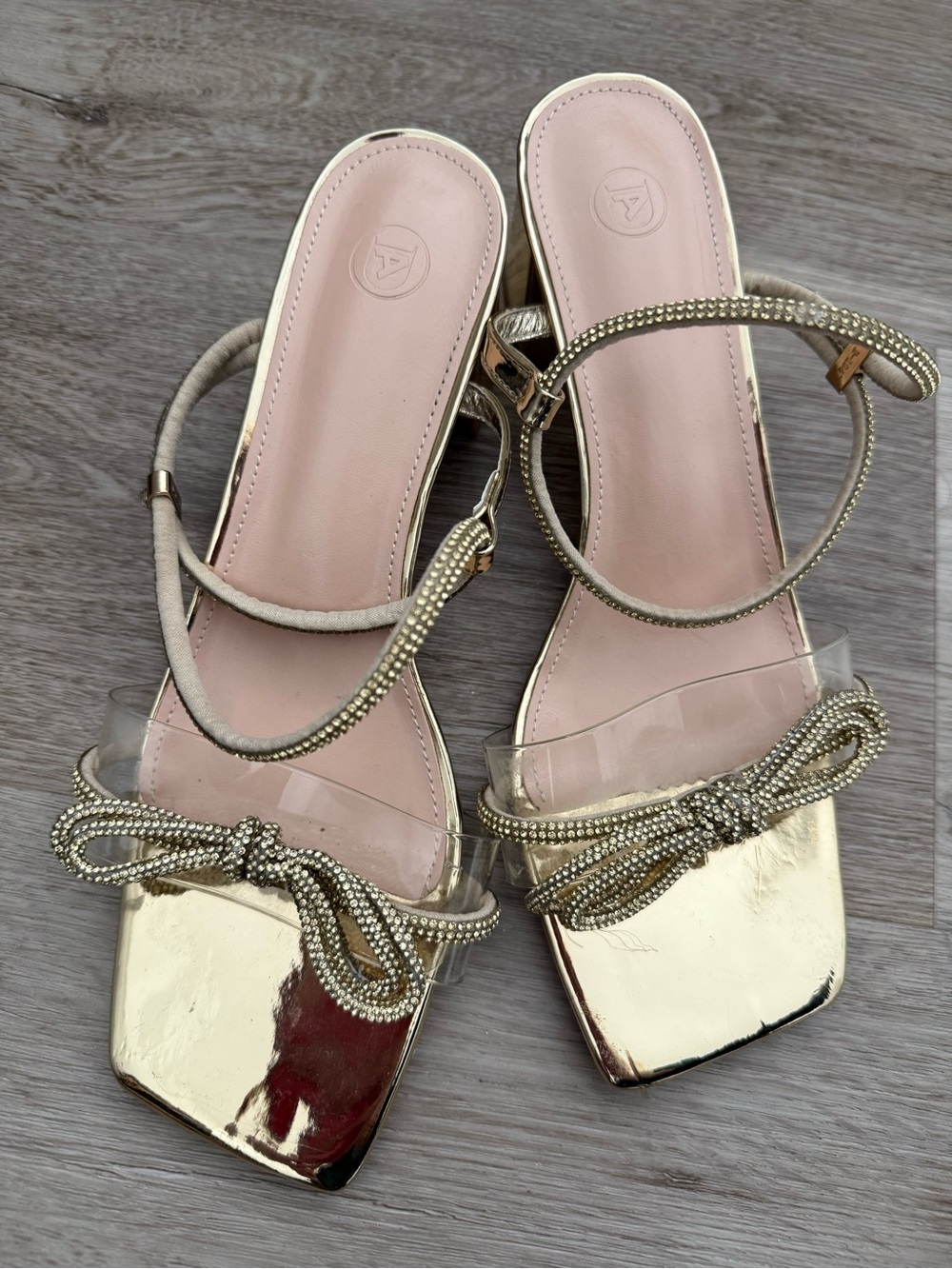 Women's Metallic Gold Bow Sandals with Clear Strap
